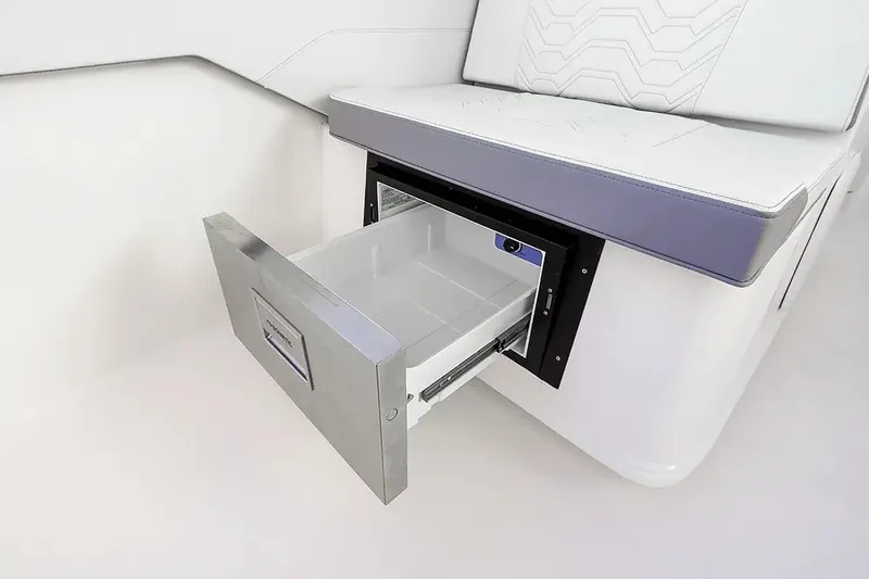 Slide: The Image of Twin Vee 280 GFX2 DC 2026 with open storage compartment. - 6