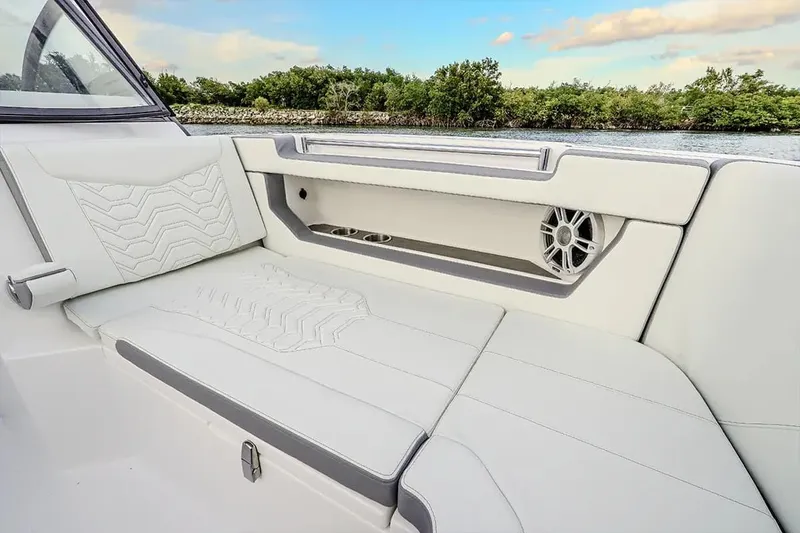 Slide: The Image of Interior of 2026 Twin Vee 280 GFX2 DC with luxurious upholstery. - 8