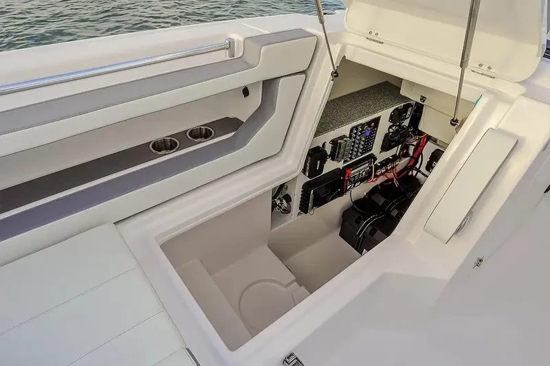 Slide: The Image of Interior view of 2026 Twin Vee 280 GFX2 DC boat with tech compartment. - 9