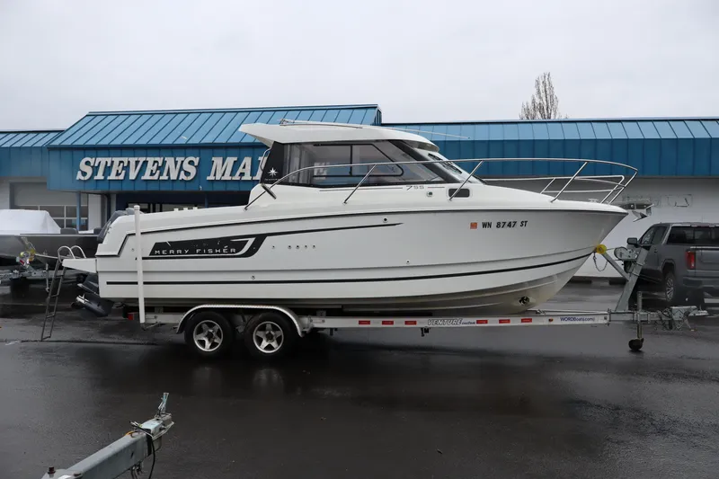 Slide: The Image of 2015 Jeanneau Merry Fisher 755 boat on trailer at Stevens Marine. - 3