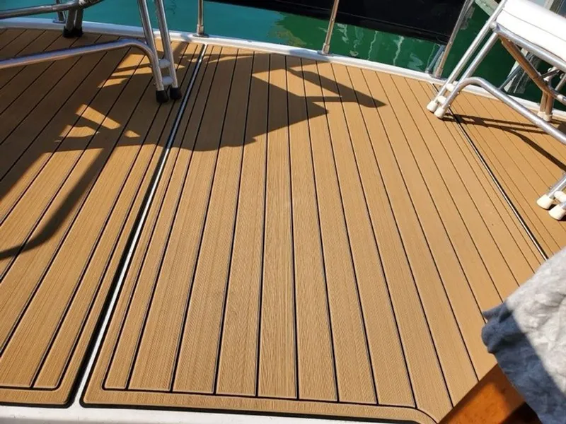Slide: The Image of Teak deck on 1983 Carver 3207 Aft Cabin boat. - 3