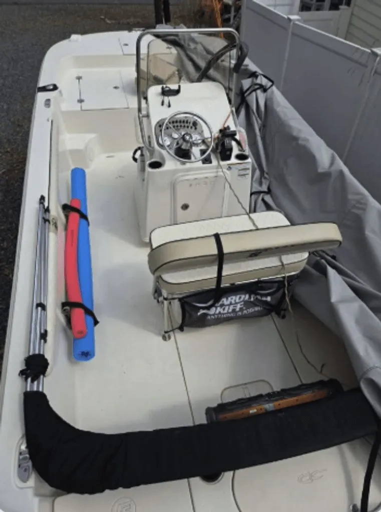 Slide: The Image of 2020 Carolina Skiff 19 LS boat with accessories and cover. - 2