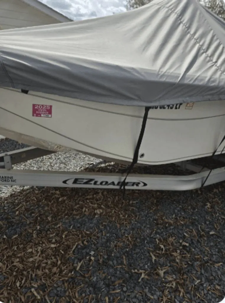 Slide: The Image of 2020 Carolina Skiff 19 LS boat on EZ Loader trailer. - 9
