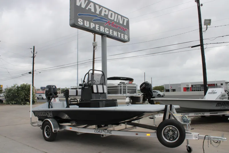 Slide: The Image of 2026 Freedom Boats 16' Eagle on trailer at Waypoint Marine Supercenter. - 11