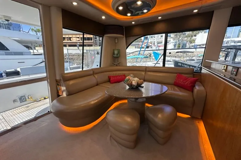 Slide: The Image of Luxurious interior of 1999 Bayliner 5788 Pilot House Motoryacht with leather seating and modern decor. - 25