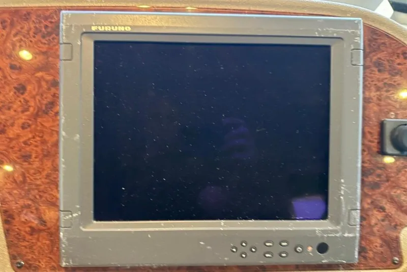 Slide: The Image of Furuno navigation display on 1999 Bayliner 5788 Pilot House Motoryacht dashboard. - 57