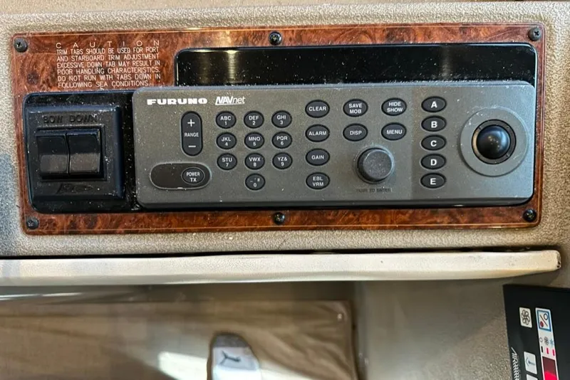 Slide: The Image of Control panel of a 1999 Bayliner 5788 Pilot House Motoryacht with Furuno NAVnet system. - 58