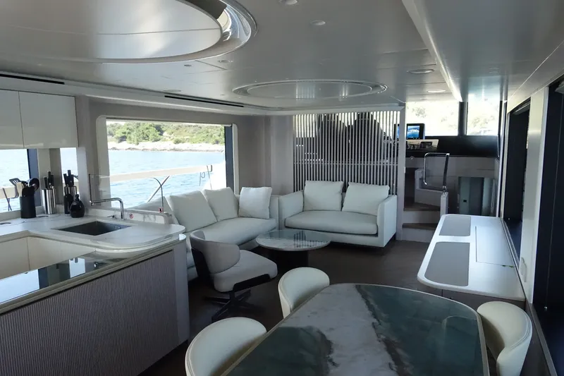 Slide: The Image of Luxurious interior of 2026 Absolute Navetta 70 yacht with modern furnishings and scenic ocean view. - 16