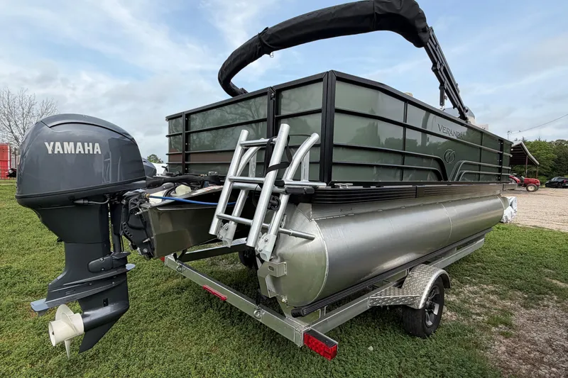 Slide: The Image of 2026 Veranda Vista 18VF4 pontoon boat with Yamaha outboard motor on trailer. - 4