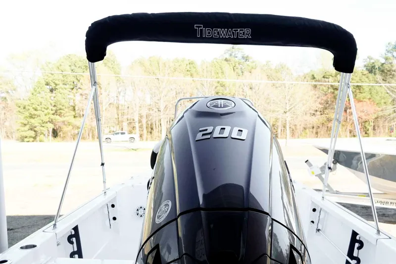 Slide: The Image of 2026 Tidewater 2110 Bay Max boat with 200 horsepower engine, rear view. - 33