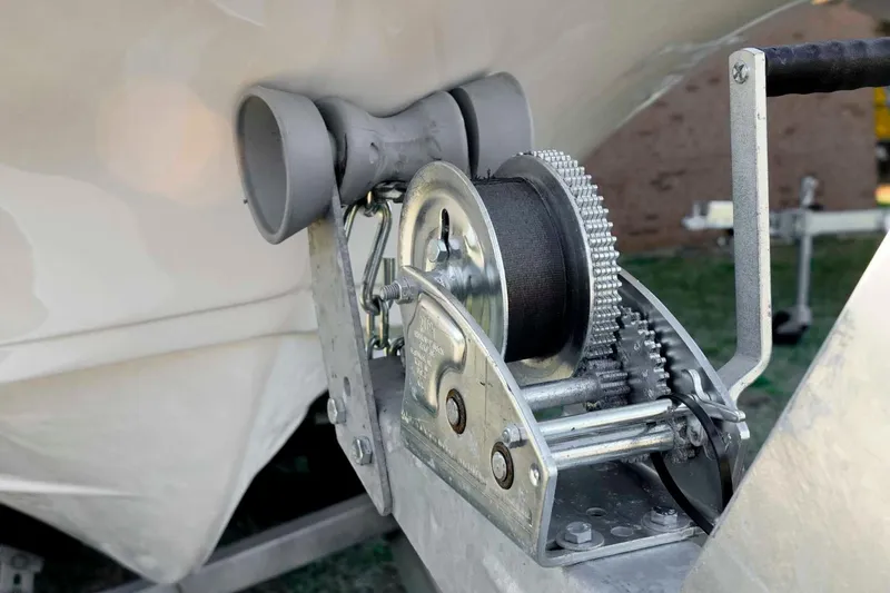 Slide: The Image of Close-up of a 2026 Tidewater 2110 Bay Max boat trailer winch mechanism. - 36