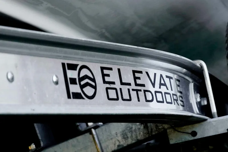Slide: The Image of Elevate Outdoors logo on Tidewater 2110 Bay Max, 2026 model boat trailer. - 38