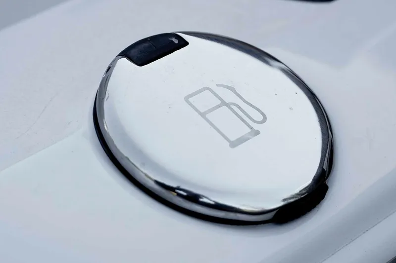 Slide: The Image of Fuel cap of 2026 Tidewater 2110 Bay Max boat, featuring a sleek chrome design. - 42