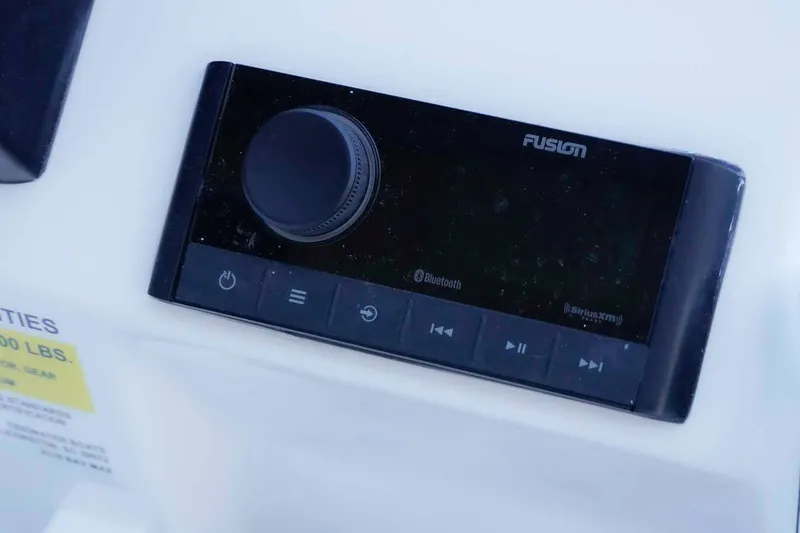 Slide: The Image of Fusion audio system on 2026 Tidewater 2110 Bay Max boat dashboard. - 7