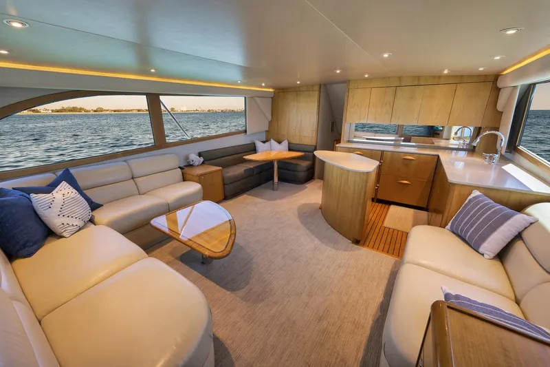 Slide: The Image of Luxurious interior of a 2003 Weaver Custom Sportfish yacht with elegant seating and ocean views. - 13