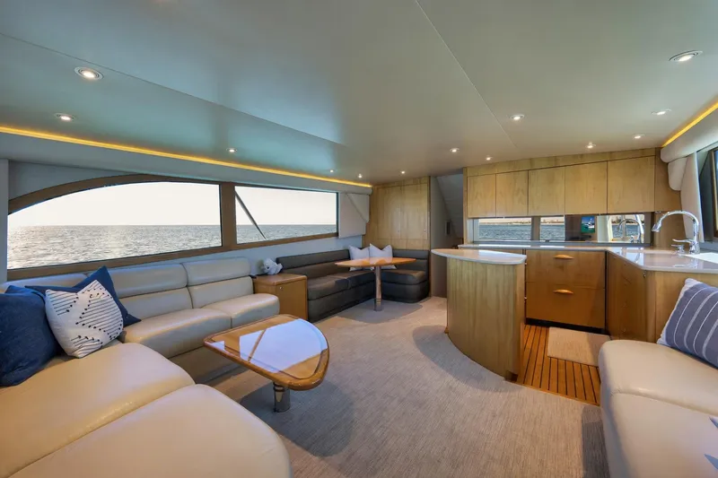 Slide: The Image of Luxurious interior of a 2003 Weaver Custom Sportfish yacht with ocean view. - 14