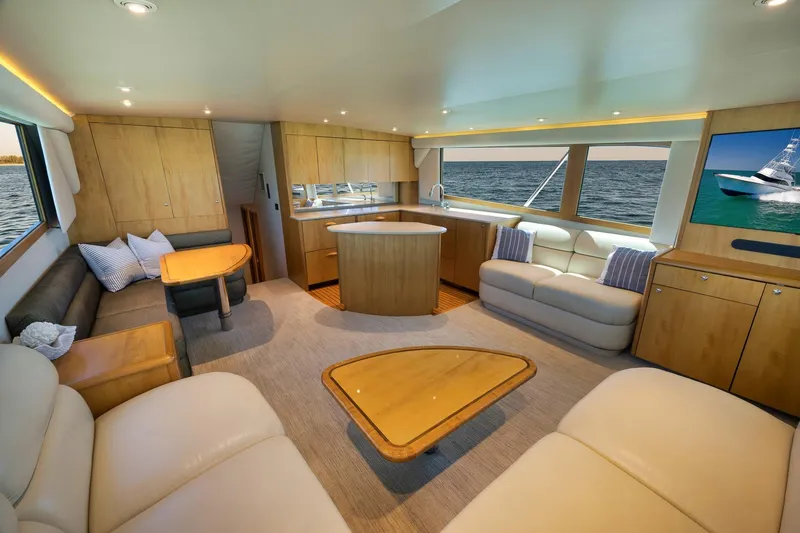 Slide: The Image of Luxurious interior of a 2003 Weaver Custom Sportfish yacht with elegant seating and ocean views. - 16