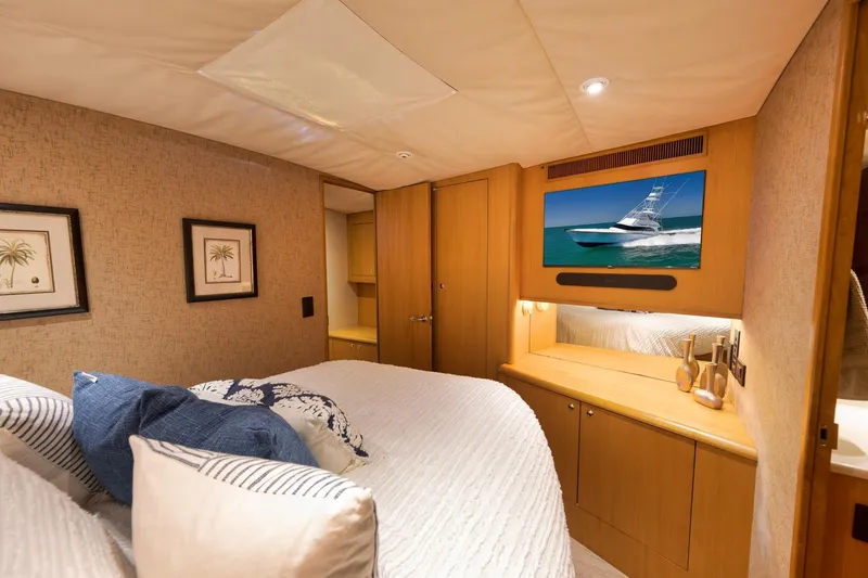 Slide: The Image of Luxurious cabin interior of a 2003 Weaver Custom Sportfish yacht with elegant decor. - 30