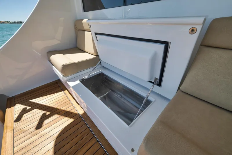 Slide: The Image of Luxury seating and storage on 2003 Weaver Custom Sportfish yacht deck. - 36
