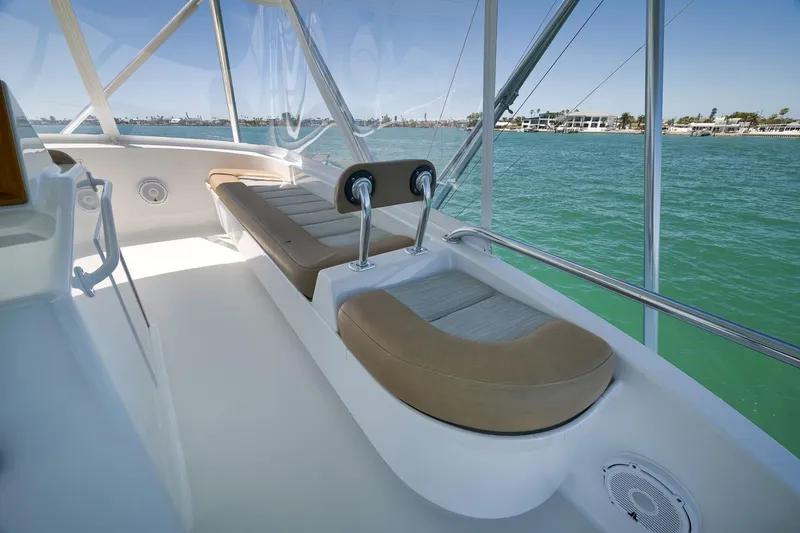 Slide: The Image of Luxurious 2003 Weaver Custom Sportfish boat interior with cushioned seating and ocean view. - 45