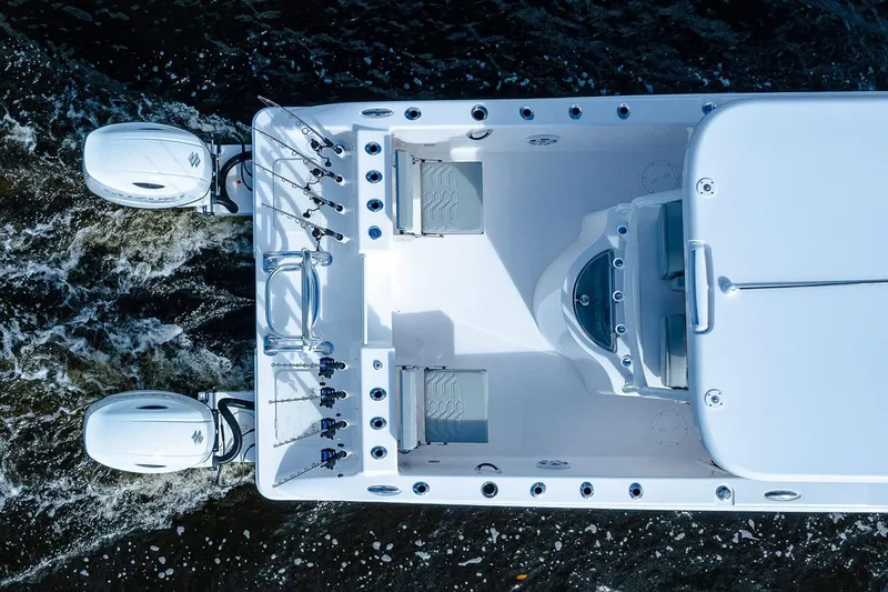 Slide: The Image of Manufacturer Provided Image: Overhead view of 2026 Twin Vee 260 GFX2 CC boat on water. - 2