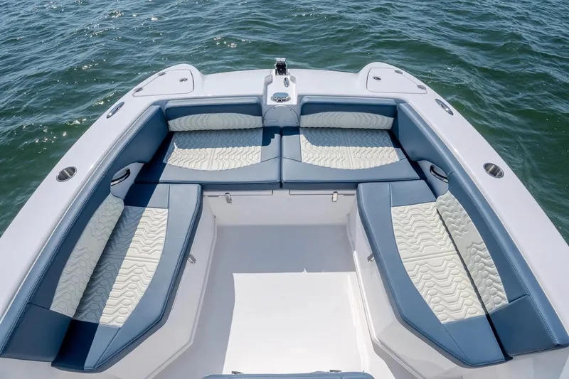 Slide: The Image of Manufacturer Provided Image: 2026 Twin Vee 260 GFX2 CC boat with spacious seating on open water. - 4
