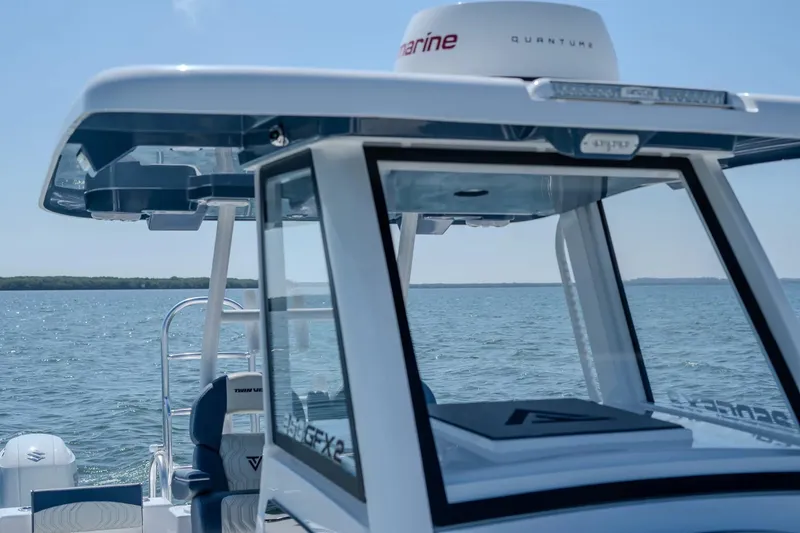 Slide: The Image of 2026 Twin Vee 260 GFX2 CC on calm waters. - 5