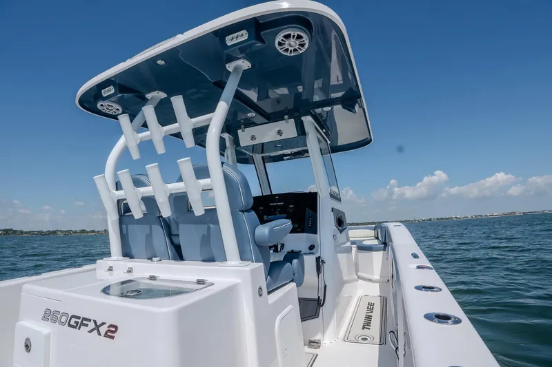 Slide: The Image of Manufacturer Provided Image: 2026 Twin Vee 260 GFX2 CC boat on water, featuring sleek design and modern amenities. - 6