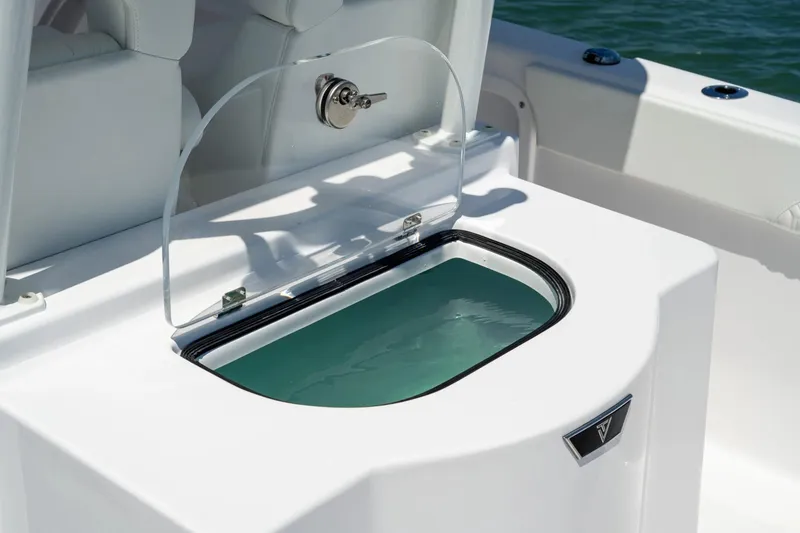 Slide: The Image of 2026 Twin Vee 260 GFX2 CC boat with open storage compartment. - 8