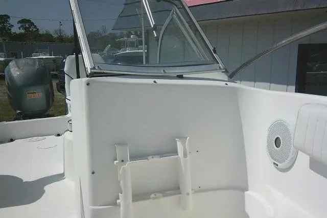 Slide: The Image of 2006 Clearwater 2200 Dual Console boat interior with seating and windshield. - 15