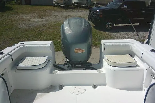 Slide: The Image of 2006 Clearwater 2200 Dual Console boat with Yamaha outboard motor, featuring spacious seating. - 20