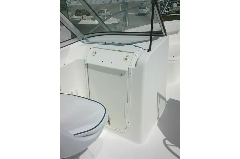 Slide: The Image of 2006 Clearwater 2200 Dual Console boat interior with seating and windshield. - 27
