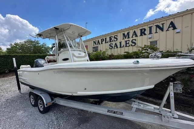 Slide: The Image of 2014 Pioneer 222 Sportfish boat on trailer at Naples Marina Sales. - 24