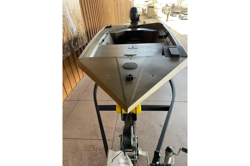 Slide: The Image of 2025 Edge Duck Boats 550 on trailer, showcasing sleek design and sturdy construction. - 4