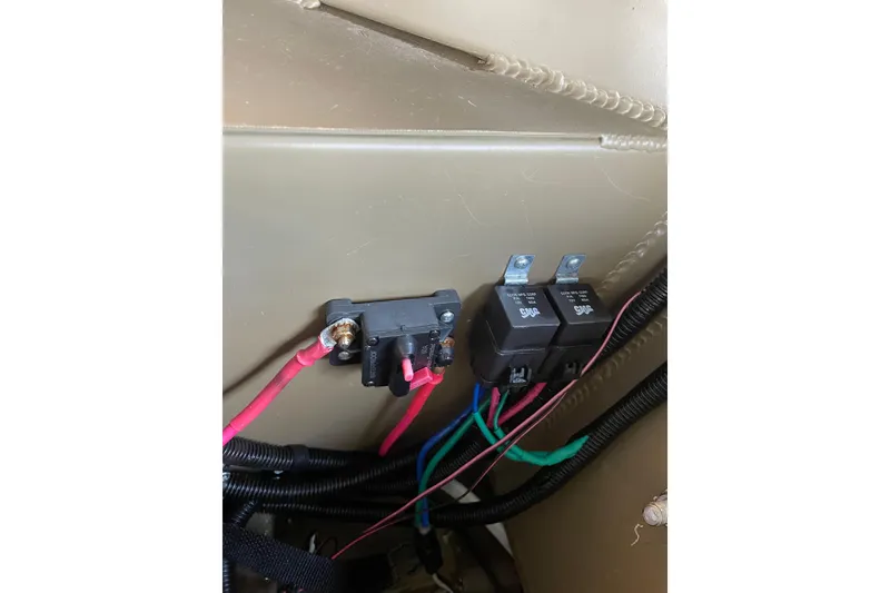 Slide: The Image of Electrical wiring and components inside a 2025 Edge Duck Boats 550 model. - 5