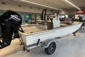 Slide: The Image of 2026 Crestliner 1860 Retriever CC boat with Mercury engine on display in showroom. - 6
