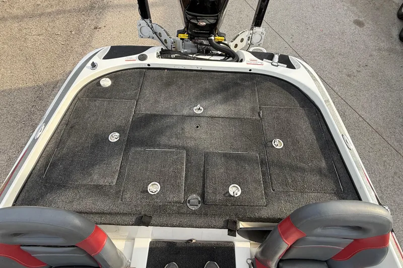 Slide: The Image of 2016 Nitro Z21 boat deck with storage compartments and seating. - 21