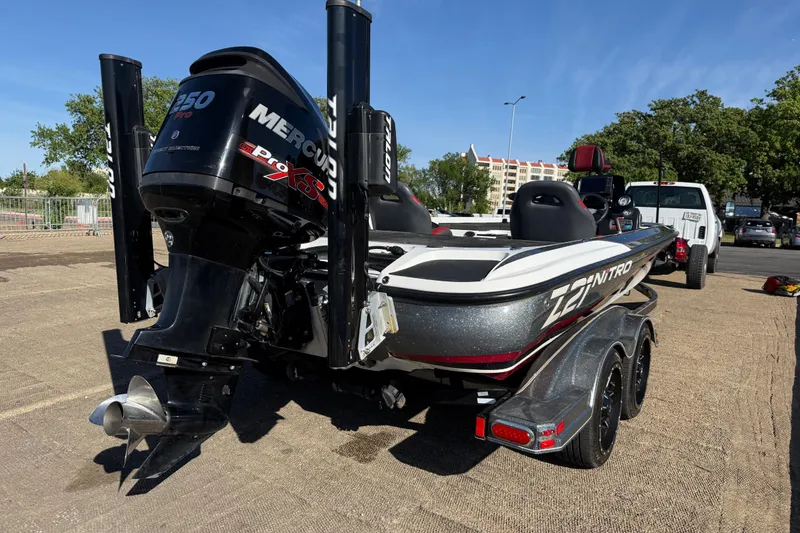 Slide: The Image of 2016 Nitro Z21 boat with Mercury Pro XS engine on a trailer. - 35