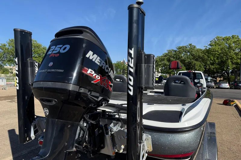 Slide: The Image of 2016 Nitro Z21 boat with Mercury 250 Pro XS engine, parked outdoors. - 36