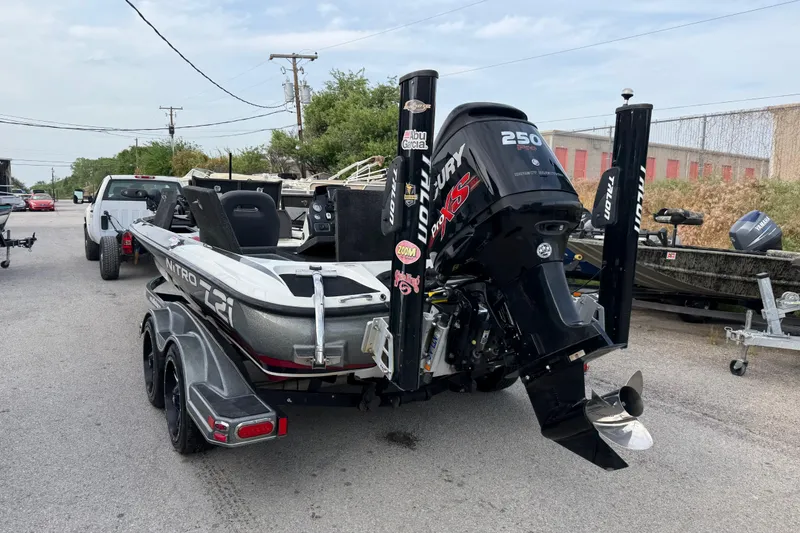 Slide: The Image of 2016 Nitro Z21 boat with Mercury Pro XS engine on trailer. - 7
