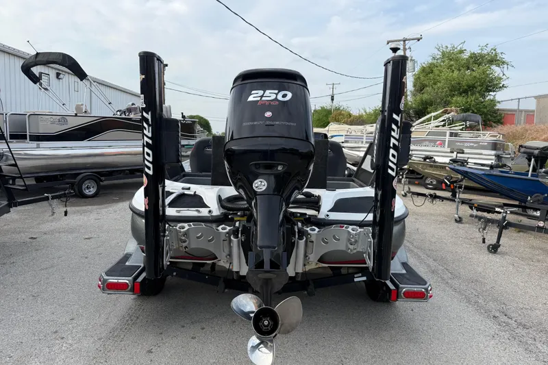 Slide: The Image of Rear view of a 2016 Nitro Z21 boat with a 250 horsepower engine. - 8