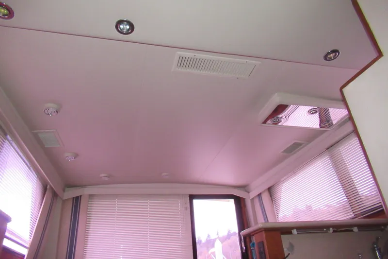 Slide: The Image of Interior ceiling of a 1990 Viking 38 Convertible yacht with recessed lighting. - 31