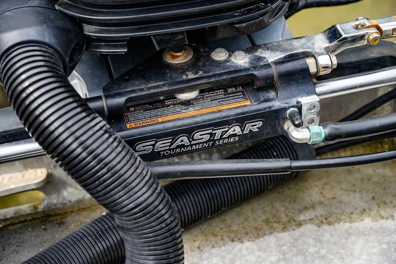 Slide: The Image of Close-up of SeaStar Tournament Series hydraulic steering on 2004 SAFE Boats Defender. - 13