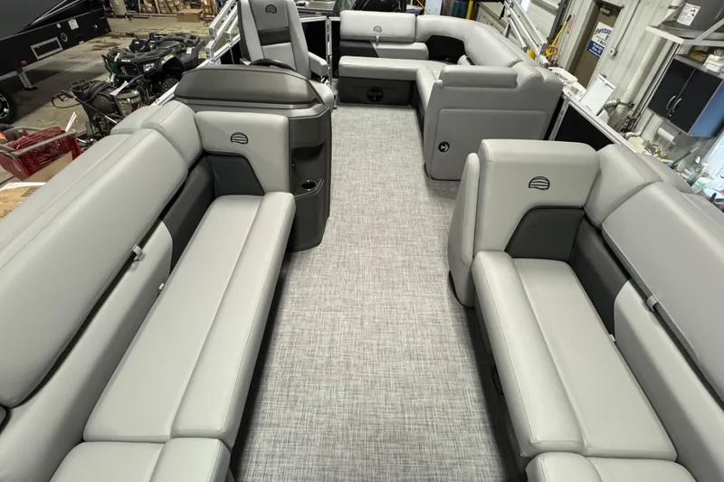 Slide: The Image of 2026 Sun Tracker Party Barge 20 DLX interior with spacious seating and modern design. - 18