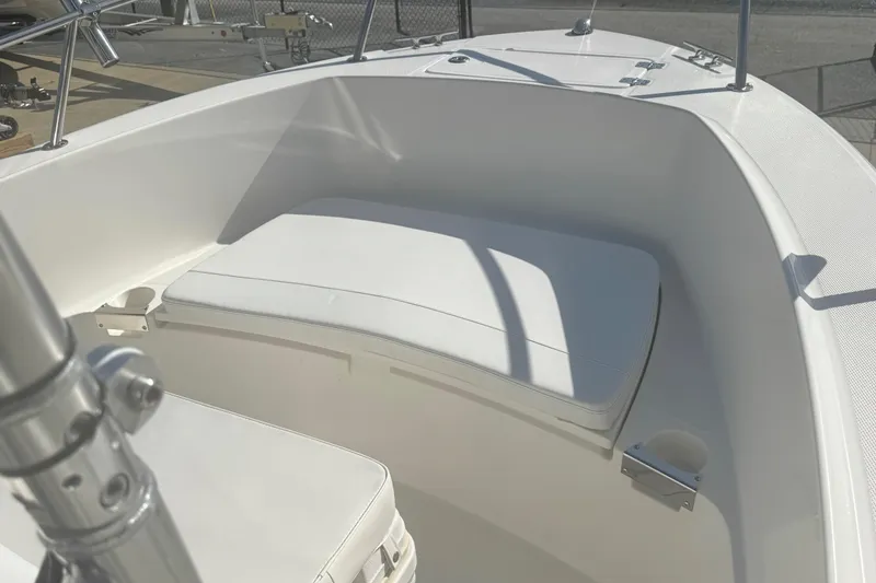 Slide: The Image of 2007 Edgewater 188CC boat interior with white cushioned seating. - 5