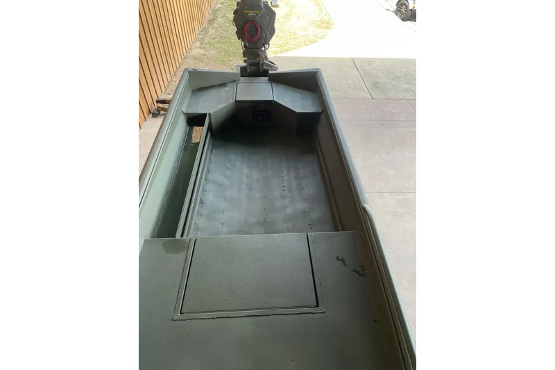 Slide: The Image of 2026 Reaper Boats 753 Timber Reaper interior view, showcasing spacious deck and storage. - 3