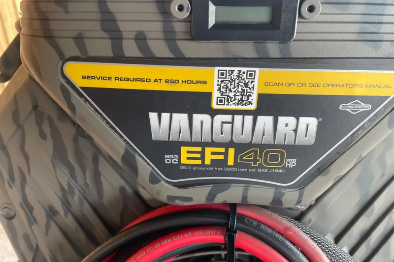 Slide: The Image of Vanguard EFI 40 engine label on Reaper Boats 753 Timber Reaper, 2026 model. - 6