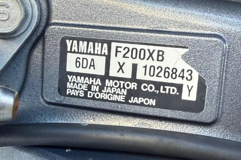 Slide: The Image of Yamaha F200XB engine label on 2017 NauticStar 243DC Sport Deck, made in Japan. - 28