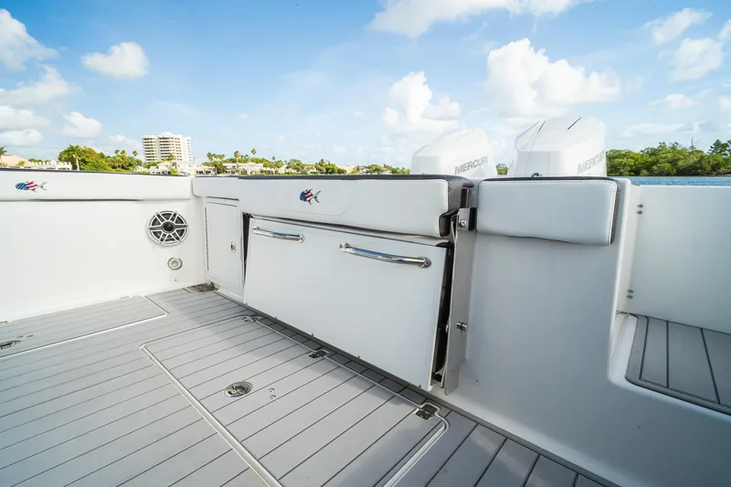 Slide: The Image of 2024 Crevalle 33 CSF boat deck with Mercury engines, sleek design, and spacious layout. - 32