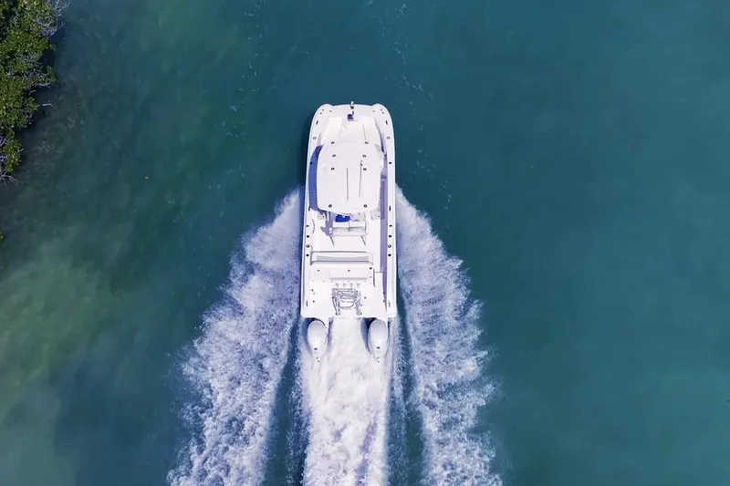 Slide: The Image of Aerial view of Twin Vee 240 GFX2 CC 2026 on water. - 15